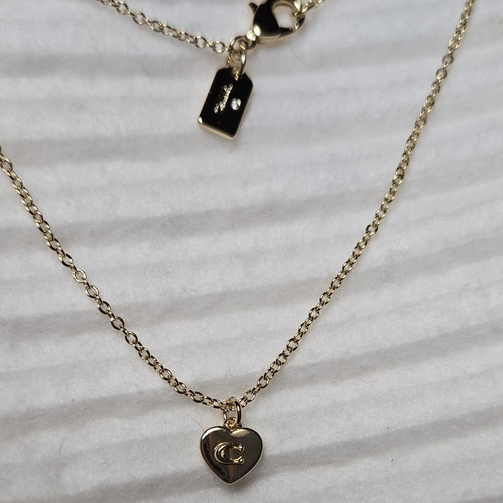 Coach Charm Necklace - Picture 2 of 10